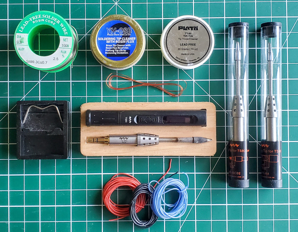 Soldering iron and tips, with components.